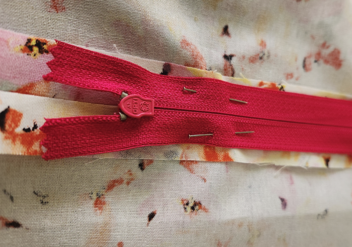 zipper tab tucked in